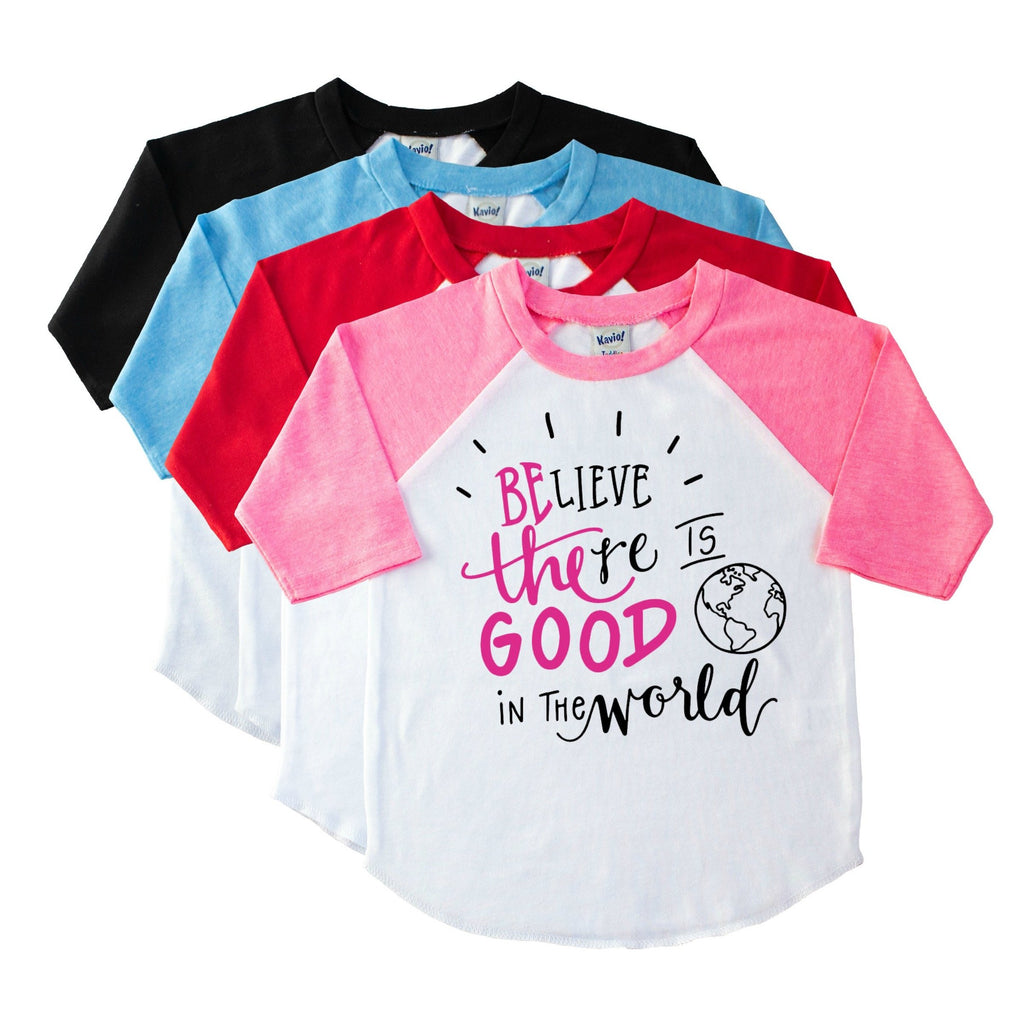 Pink sleeve raglan with Believe there is good in the world in pink and black on the front