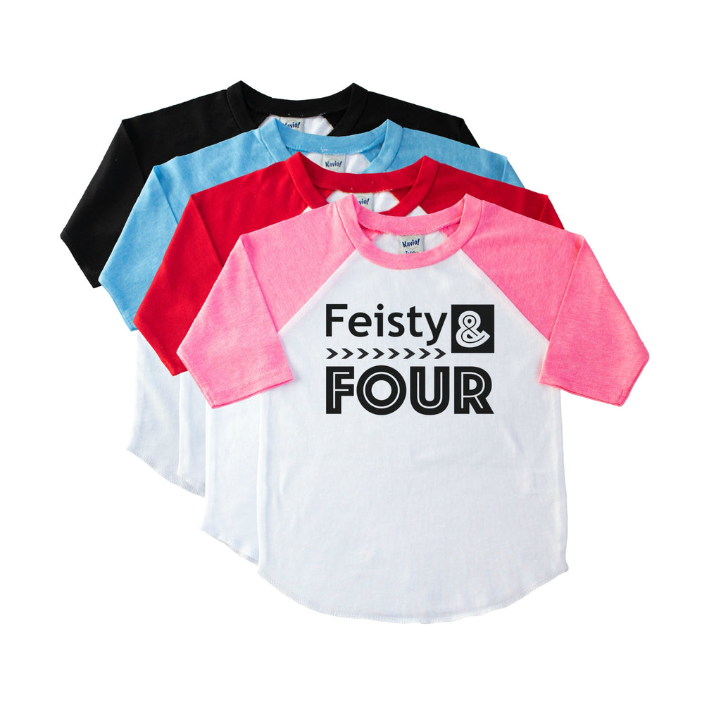 Pink sleeve youth raglan tee atop a stack of shirt colors with Feisty and Four in black on the front