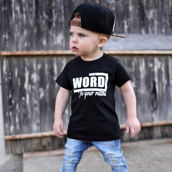 Little boy wearing black tee that says Word to Your Mutha in white