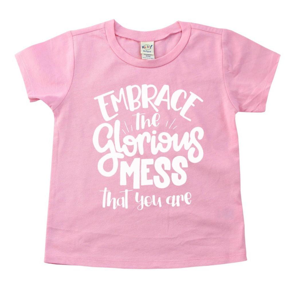 Pink tshirt with embrace the glorious mess that you are in white