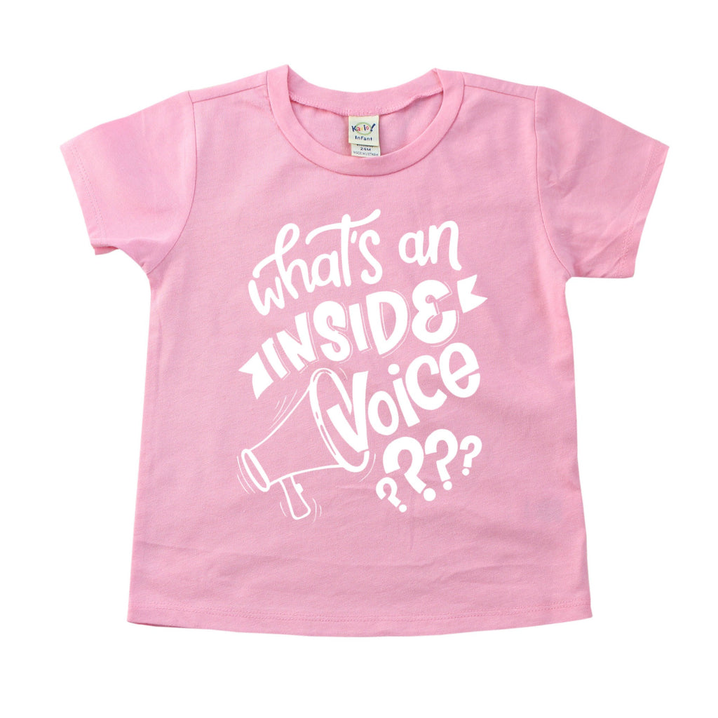 Pink tee with what's an inside voice in white